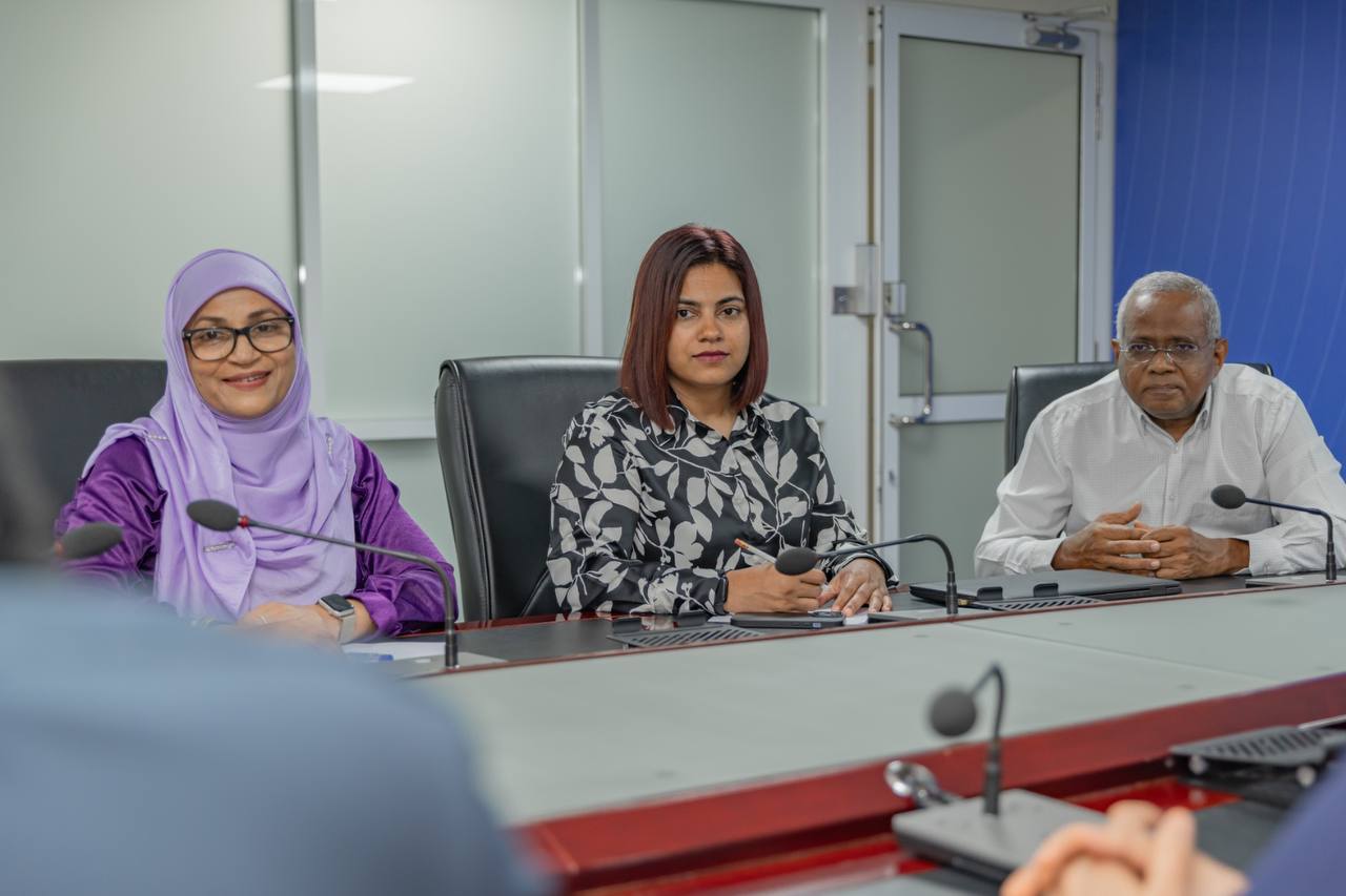 Three members of the Maldives Financial Sector Awards judging panel seated at the deliberation table