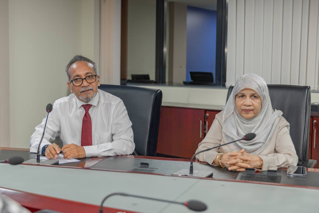 A juror pair of the Maldives Financial Sector Awards in deliberation at the Maldives Monetary Authority